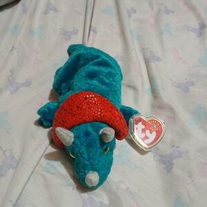 Teal Plush Dinosaur with Red Hat